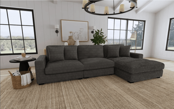 a gray upholstered modular sectional sofa reconfigured in a compact setting by removing a few compartments to open space