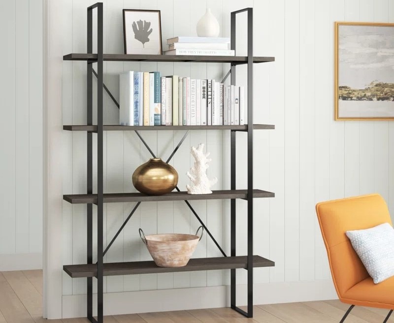 an open bookshelf equipped with office books and files, and decorative displays