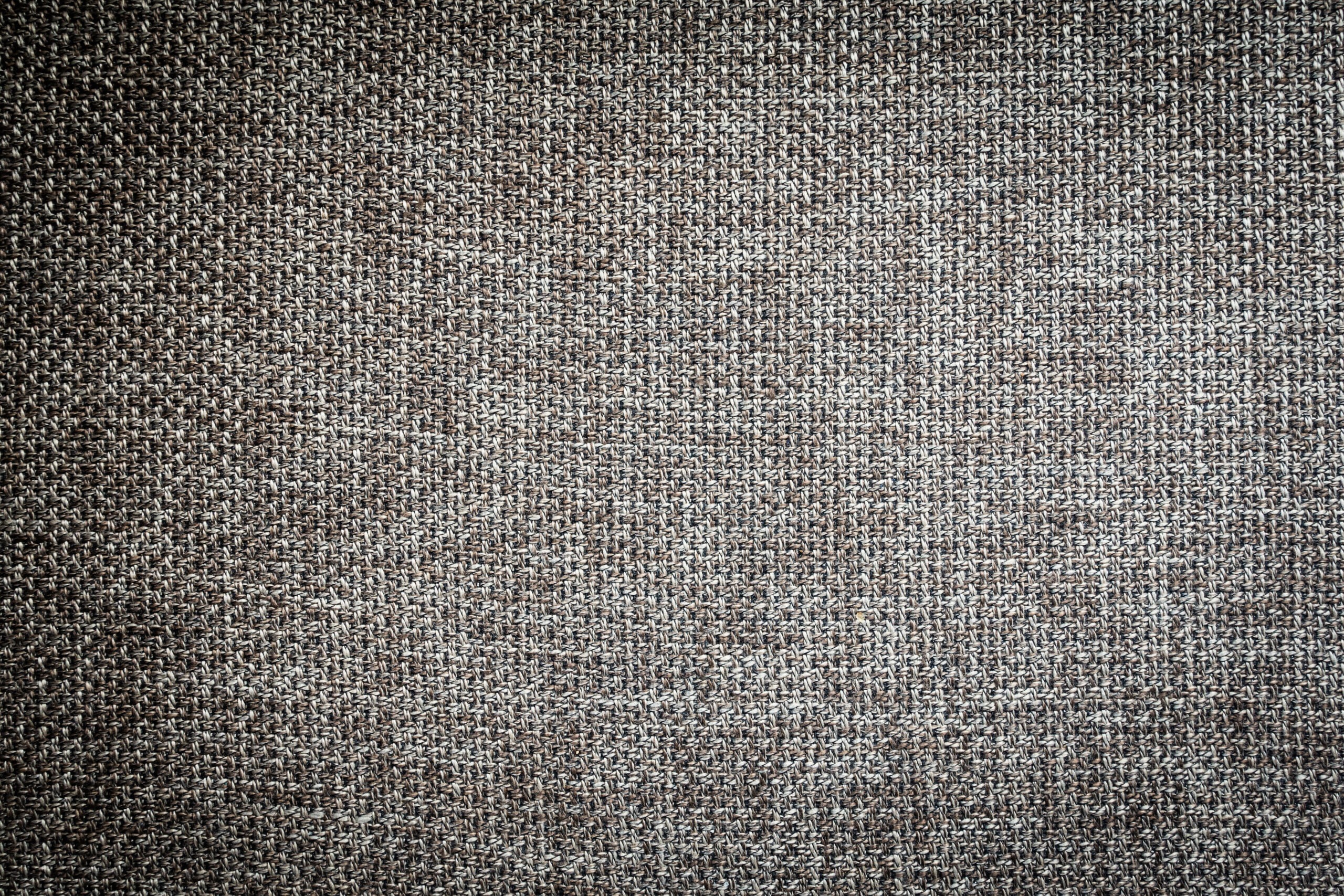 textured gray-black tweed upholstery fabric close up