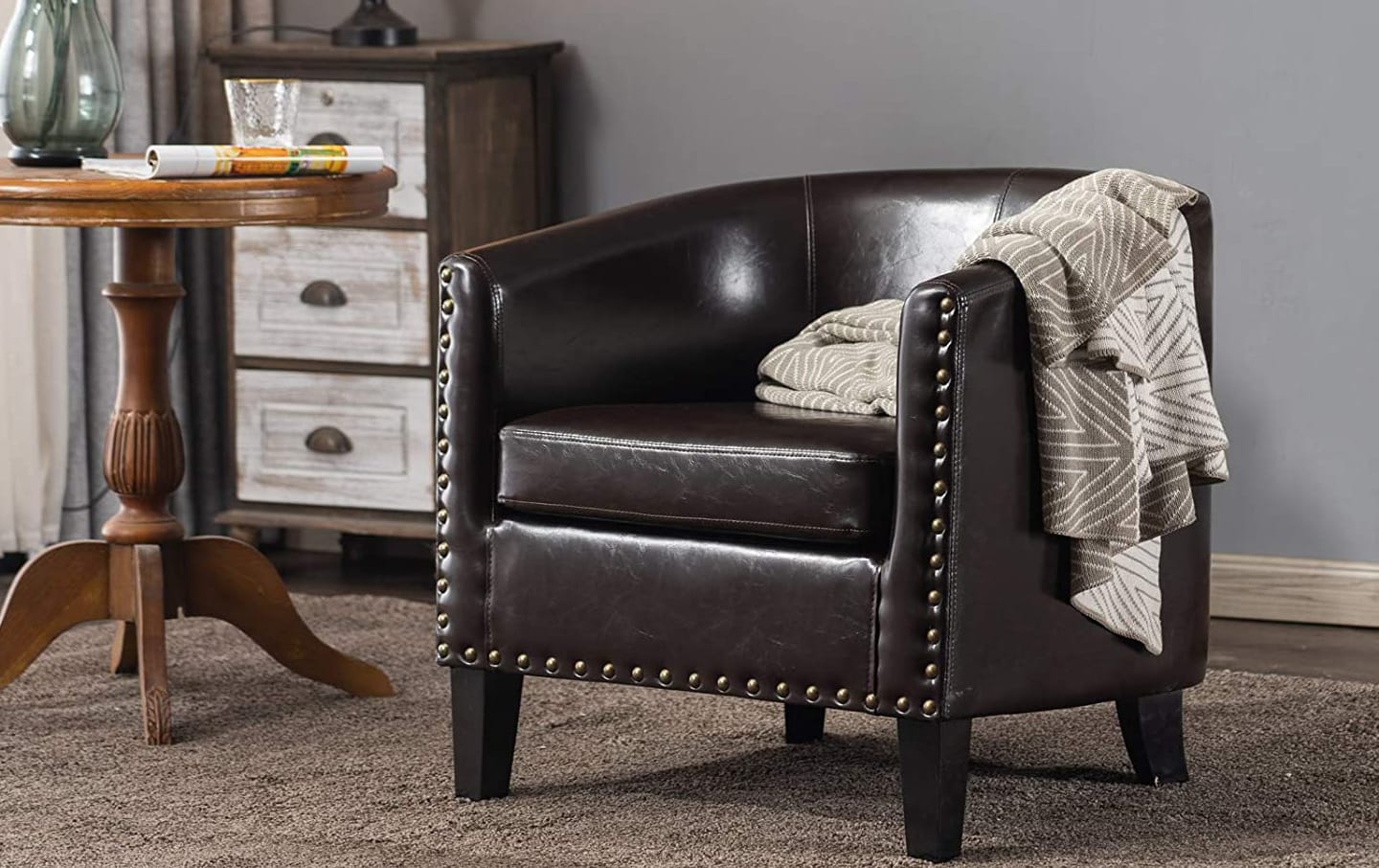 a cleaned and polished brown leather accent chair