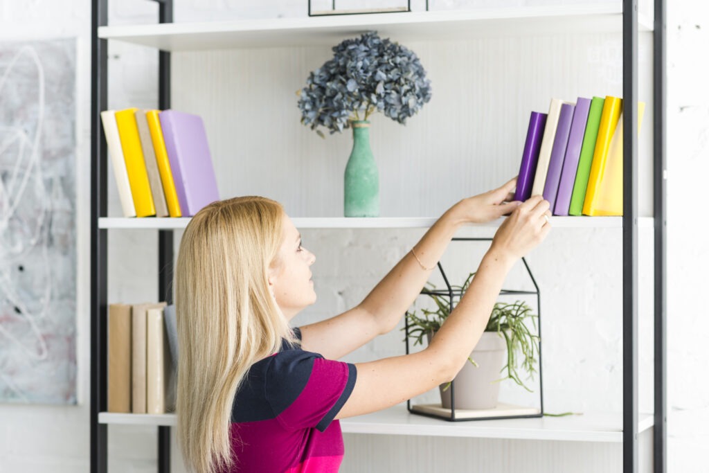 A woman organizing shelf