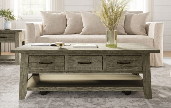 weathered cocktail table with three drawers