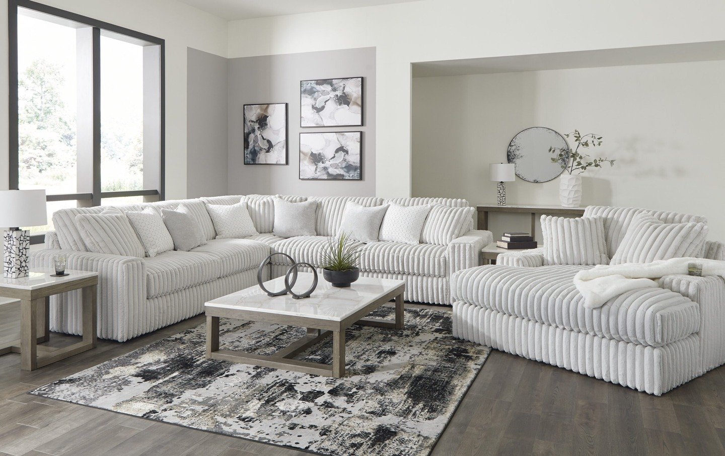Casual living room with oversized cushioned sofa set