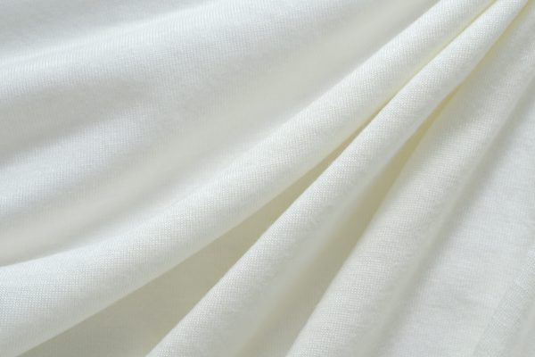 Close up of crumpled natural white cotton after upholstery cleaning